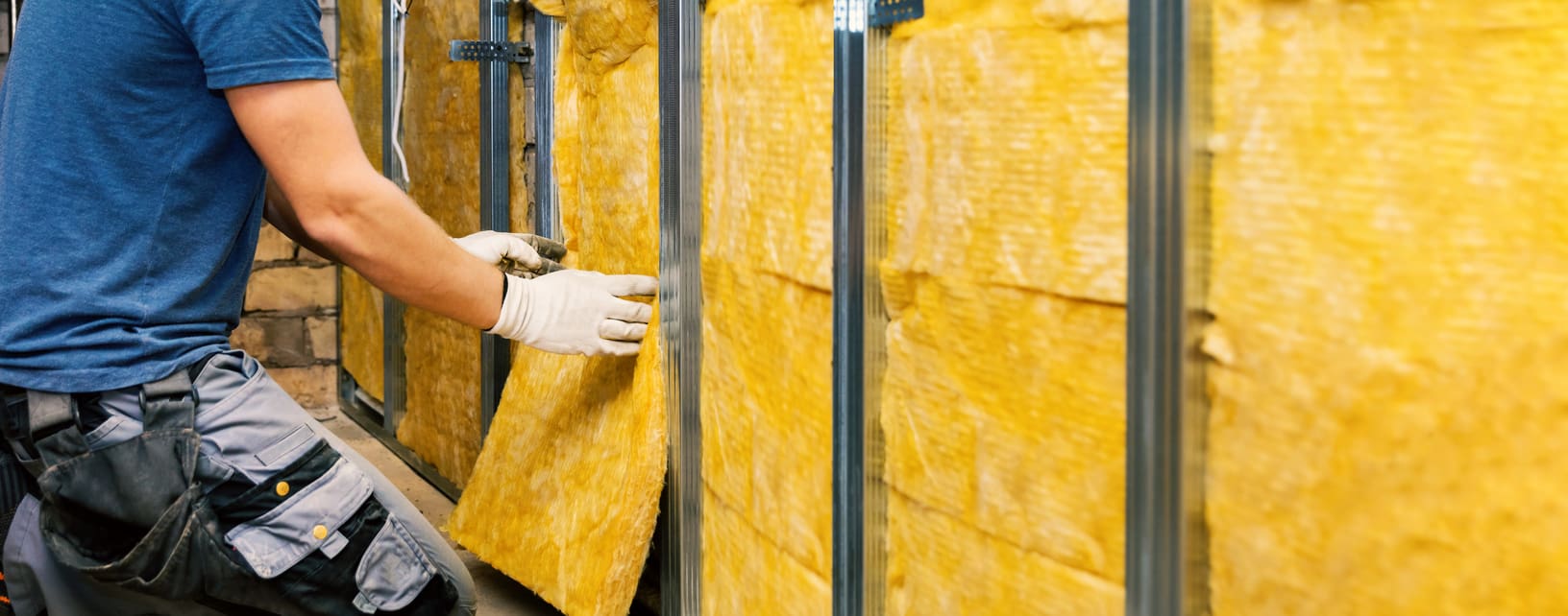 house-wall-insulation-construction-worker-installing-glass-wool-into-the-metal-profile-frame-indoors-banner-with-copy-space